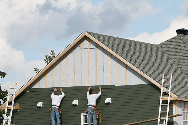 Professional Storm Damage Siding Repair technician working in Richwood, TX